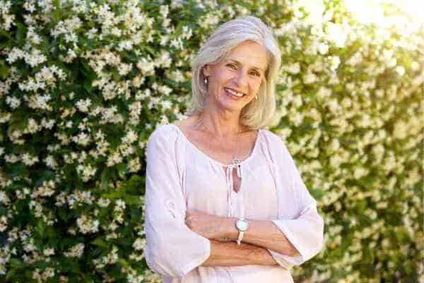 Older woman happy with urinary incontinence treatment Wales