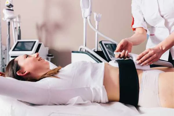 woman having body sculpting to help improve her body image and her mental health Wales